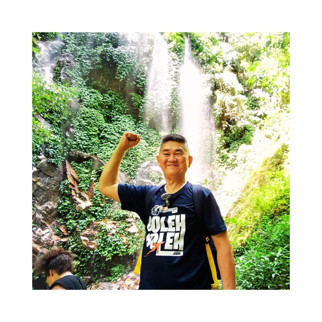 founder of diy business system wong toong poo at royal belum ranforest waterfall